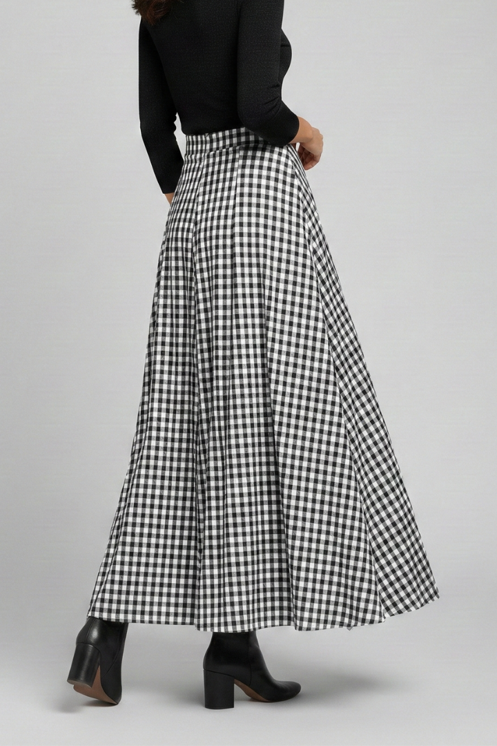 Back view of long checked skirt in gray background