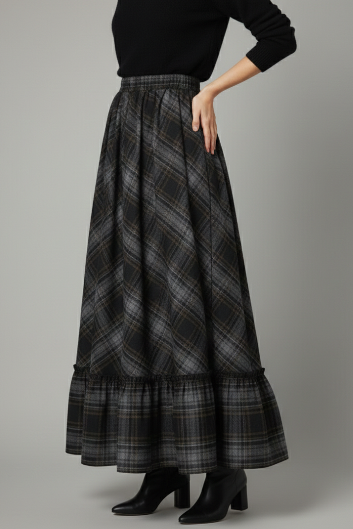 Side angle of textured plaid skirt on female model