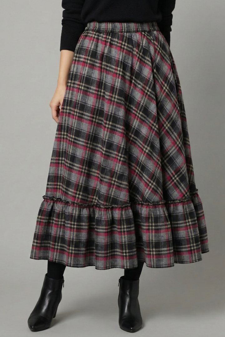 Front view of high waist plaid skirt wearing by model in gray background