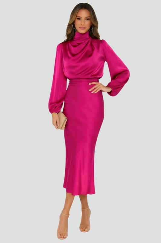Woman wearing casual elegant midi dress front pose gray background.
