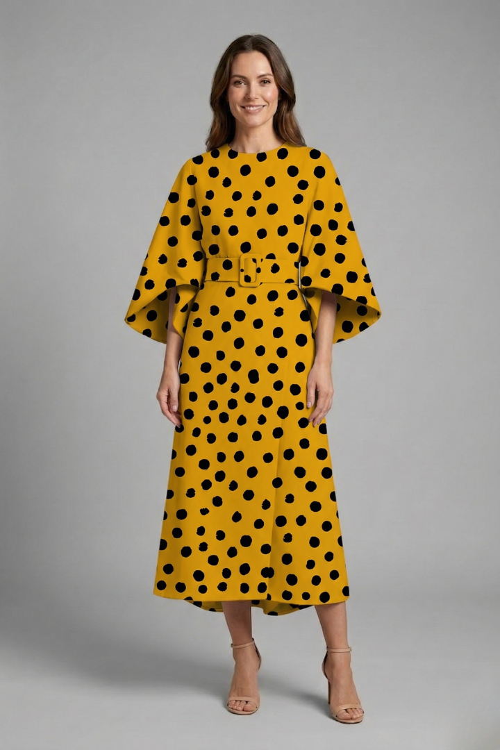Woman front view wearing midi dress on plain gray background.