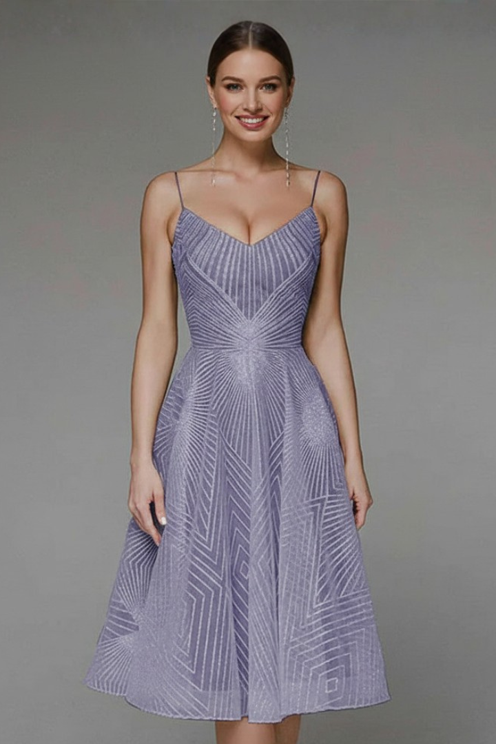 Front view shot model in geometric print dress detail
