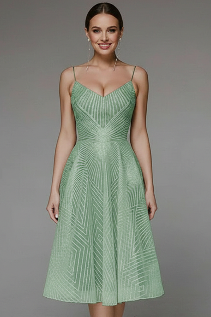 Front-facing image of modern patterned sleeveless green dress