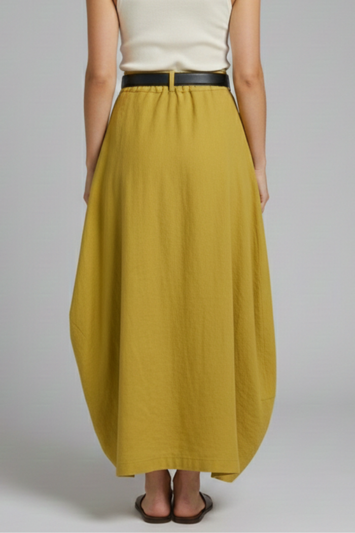 Back view model in asymmetric hem midi skirt