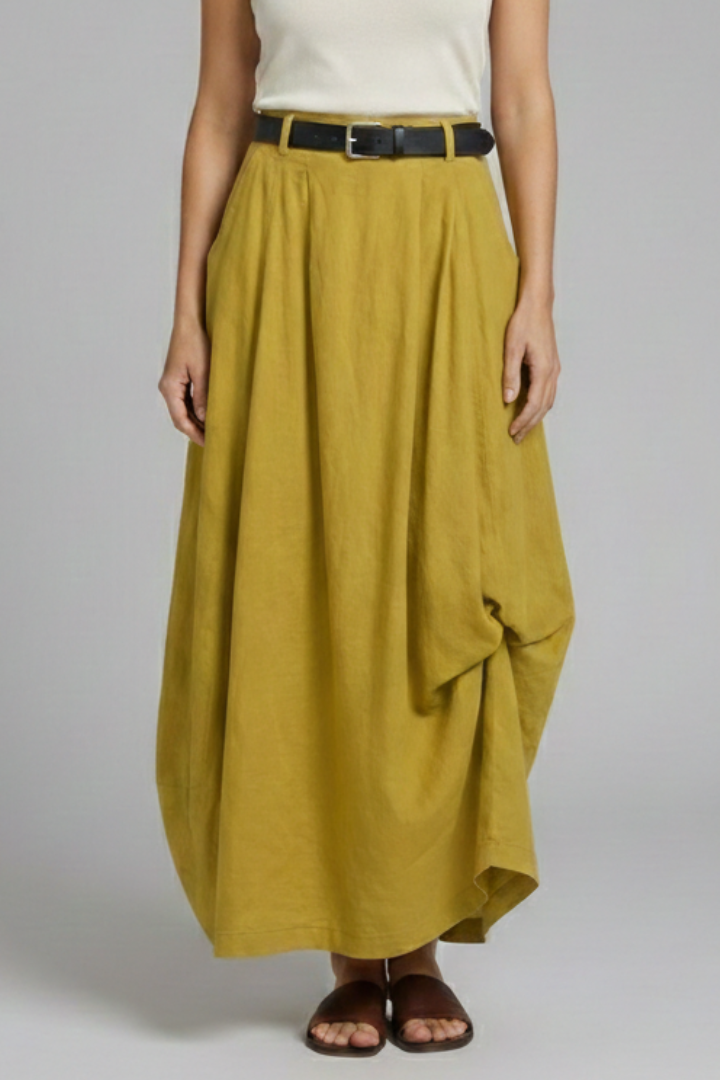 Front view model in belted draped midi skirt