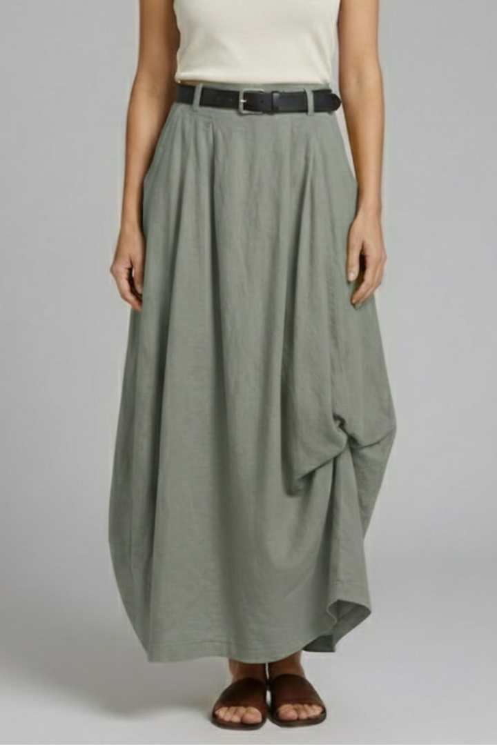 Full body model wearing belted textured gray skirt