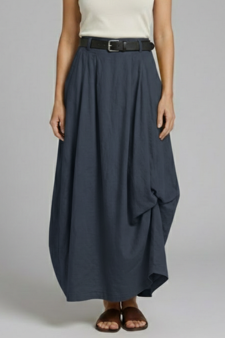 Model in high waisted skirt front angle
