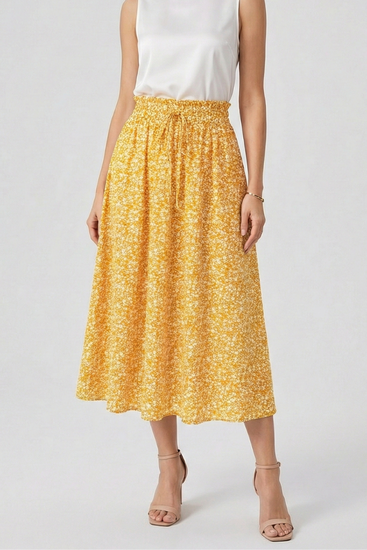Front close-up of waistband tie yellow skirt in white background image
