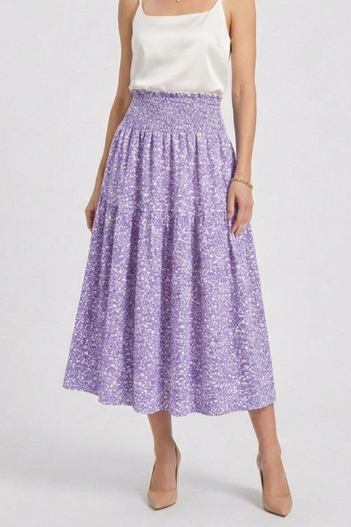 Minimalist floral purple skirt display gray background photo