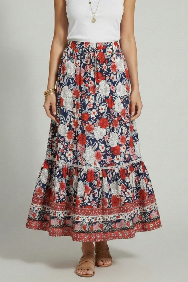 Model showing elastic waist floral skirt and white top with sandal