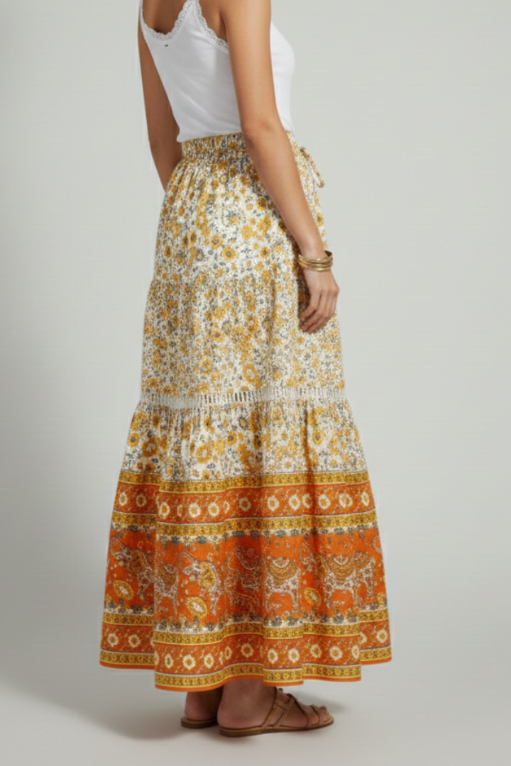 Side back view of printed midi skirt on model