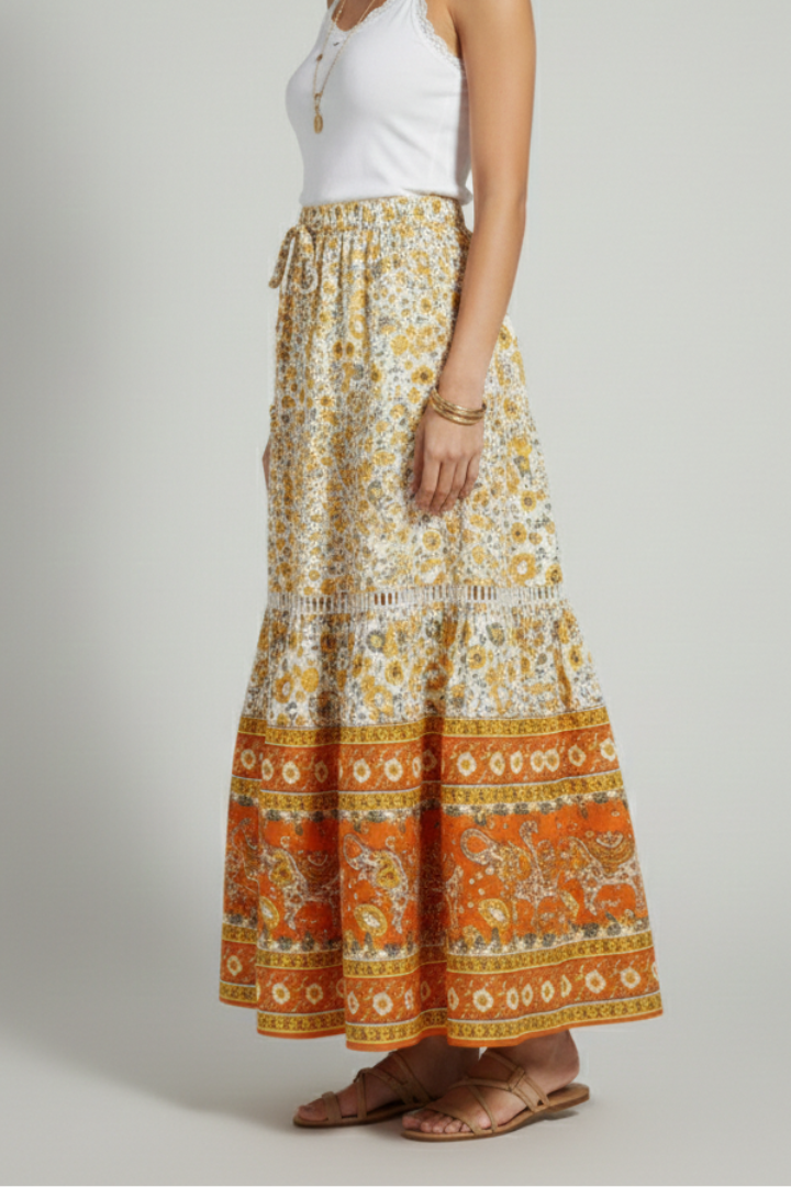 Side angle of floral skirt with model gray backrop