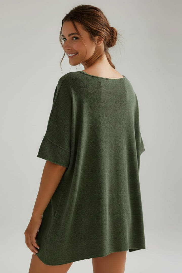 Back angle of oversized ladies shirt studio display