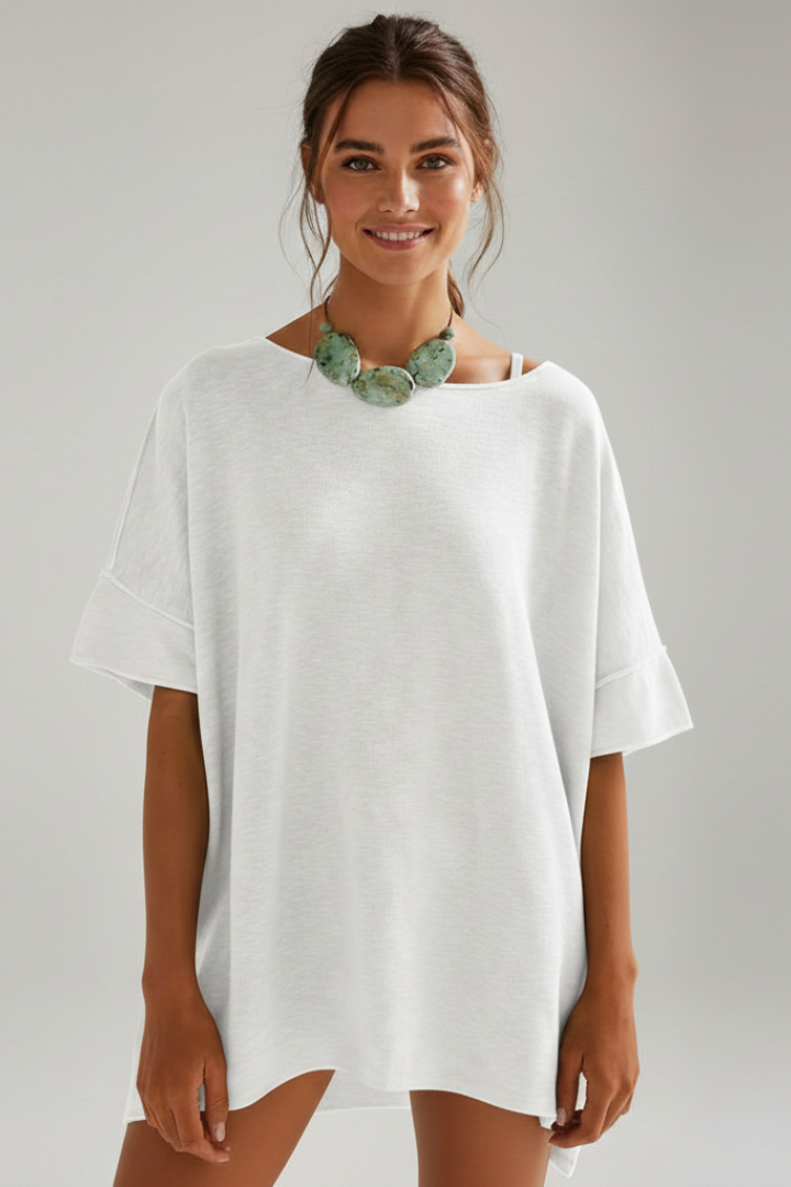 Loose women’s wardrobe essential white tee shown in product image