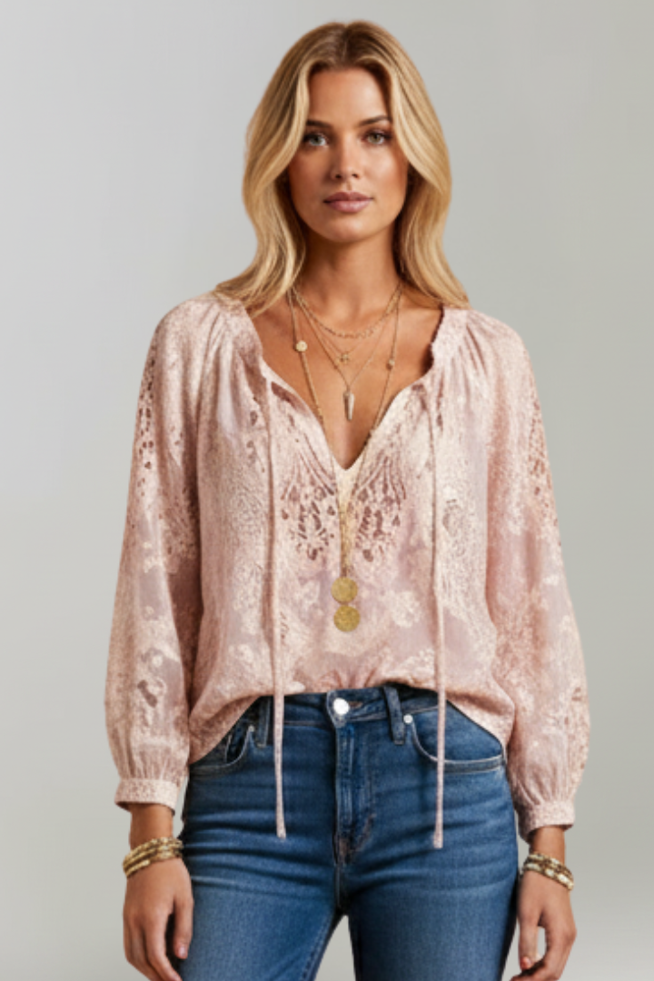 Front view blush sheer crochet blouse on model