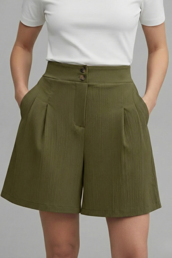 Wide leg olive green shorts shown on female model