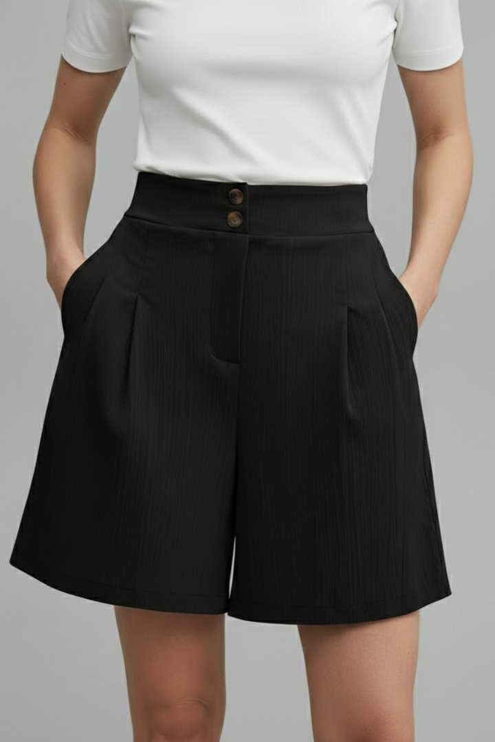 Relaxed fit black shorts angle gray background
