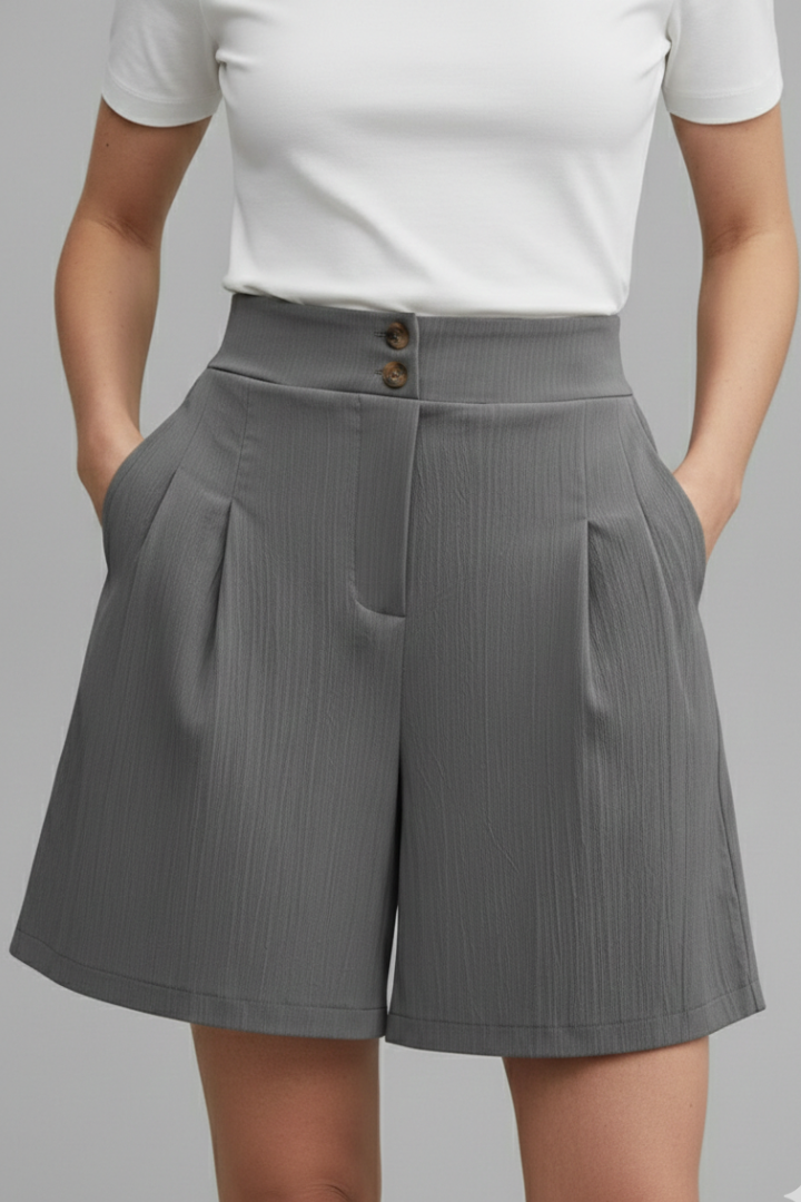 Front view of women’s structured shorts gray backdrop