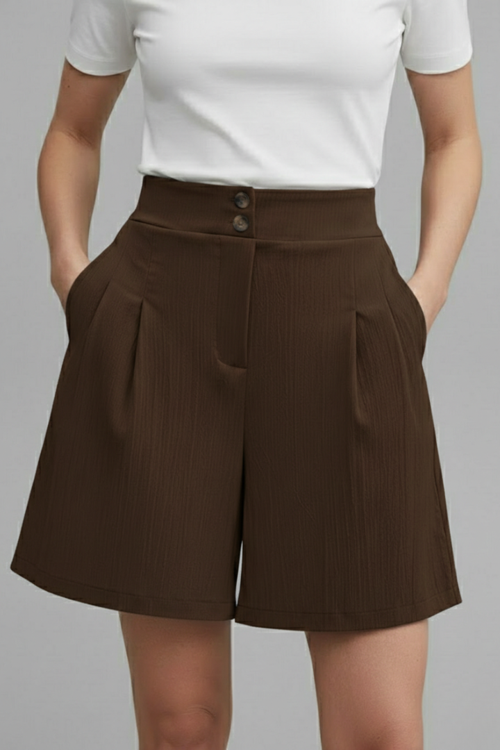 Female model front pose in structured shorts with pockets