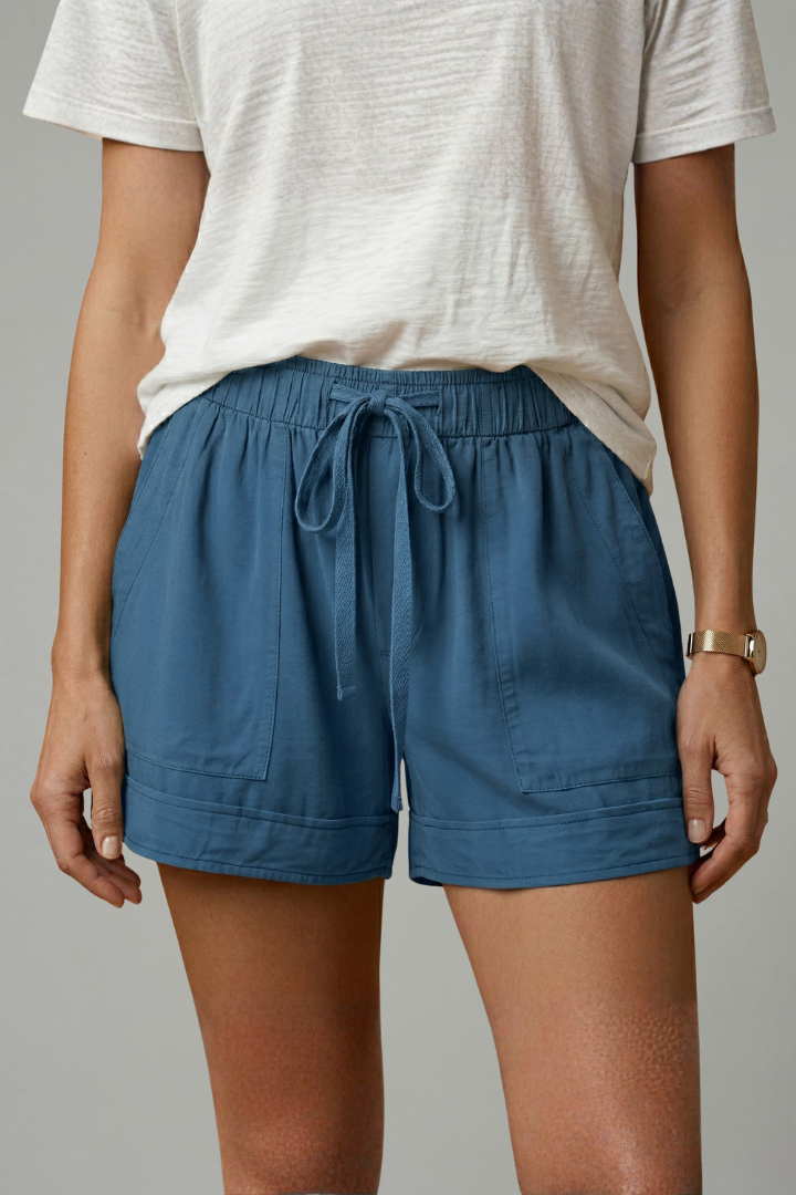 Model wearing loose leg shorts 