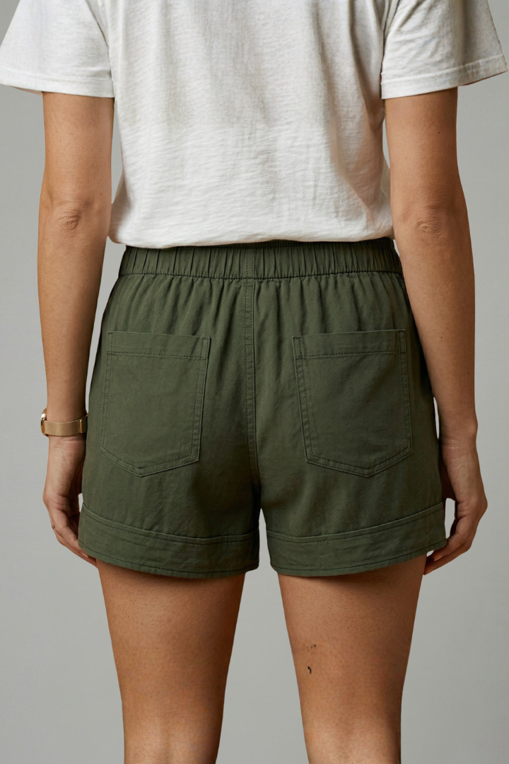 Back view of loose shorts wearing by a female model