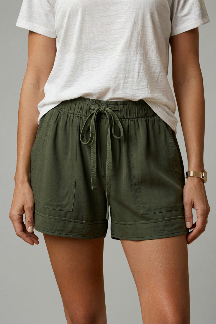 Model side pose in casual shorts with drawstring waistband