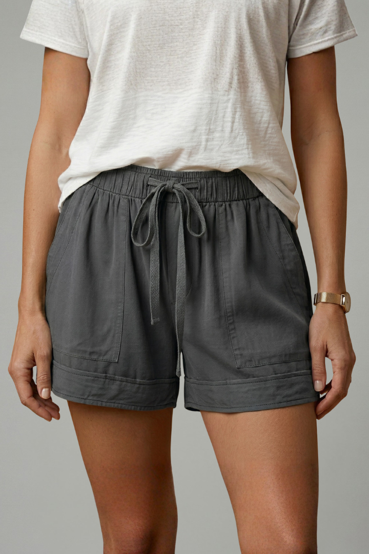 model posing in relaxed summer shorts