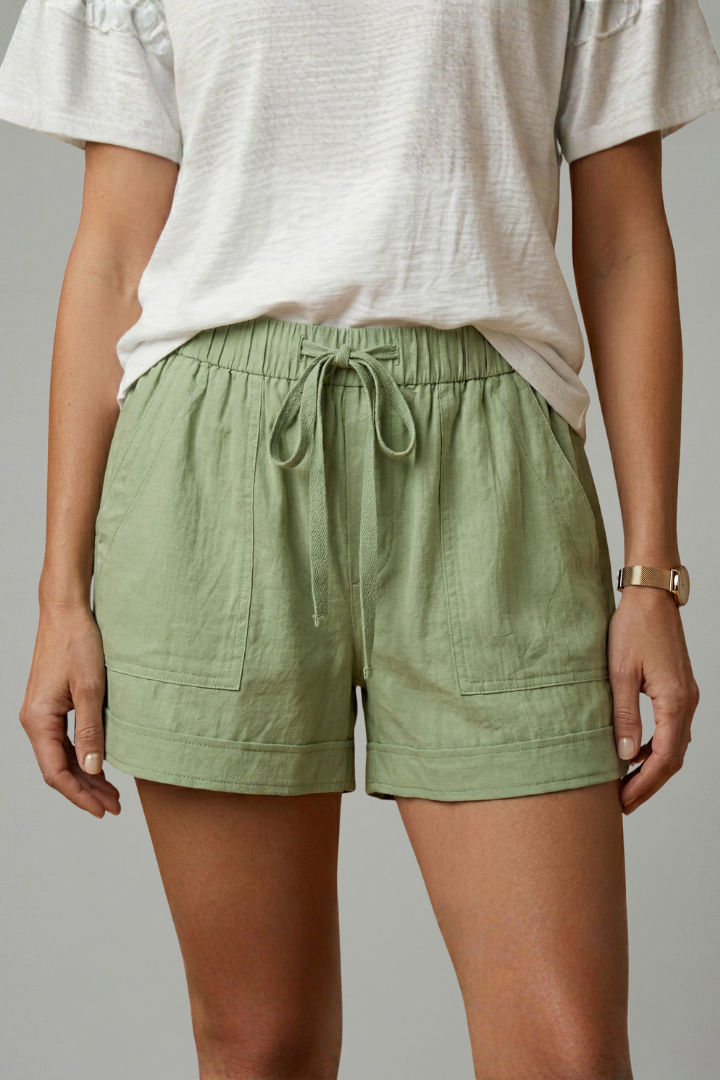 Front studio shot casual green shorts with drawstring