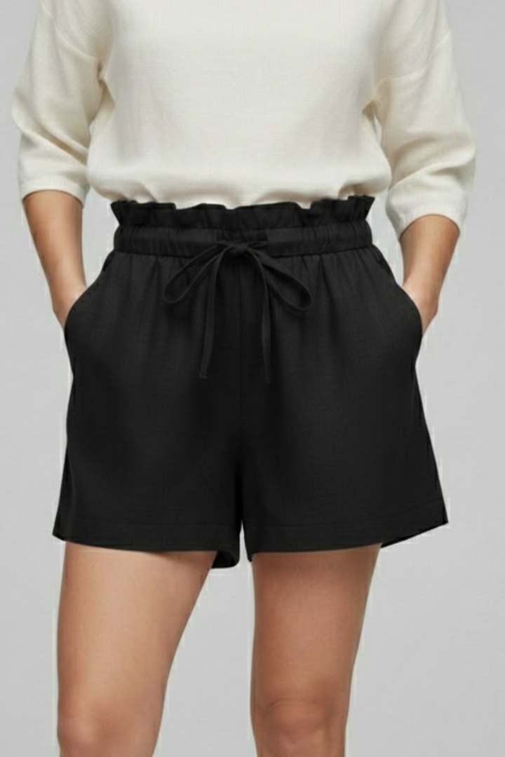 Short length casual black shorts with drawstring on female model