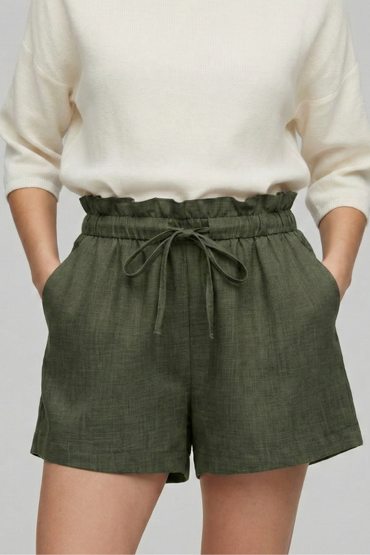 Female model showing side pocket shorts detail