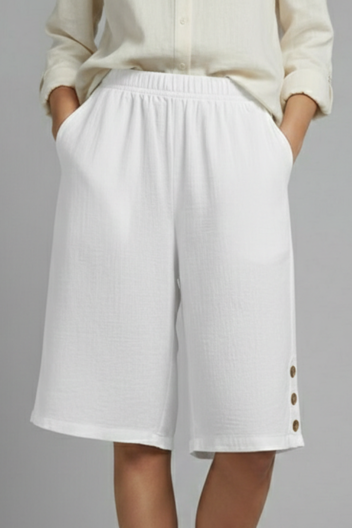 Casual white shorts on model studio background