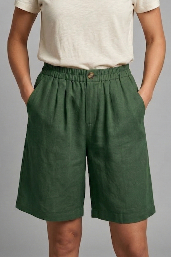 Front angle of green shorts with side pockets