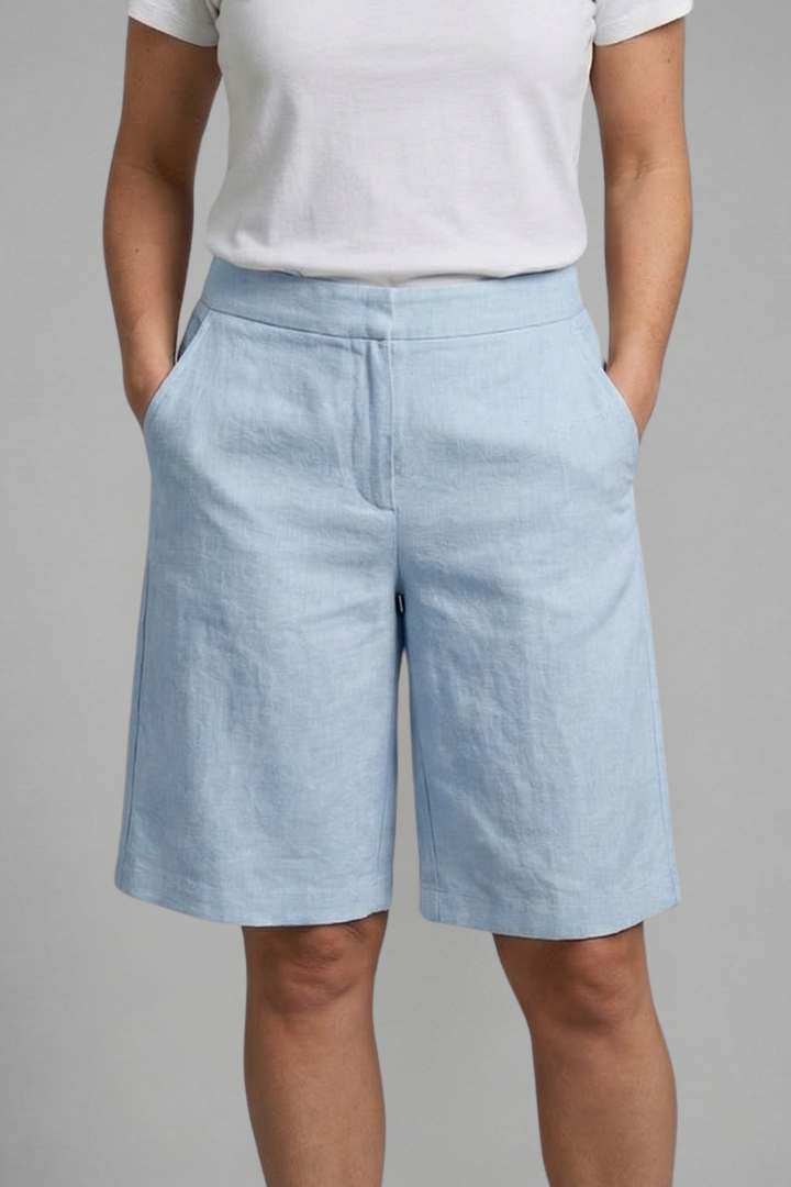 Front pose woven blue shorts on gray background