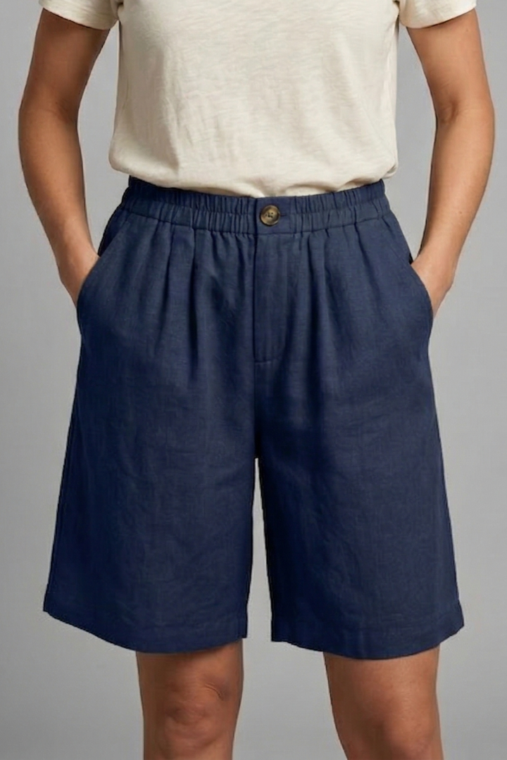 Female model showing shorts with hip pockets