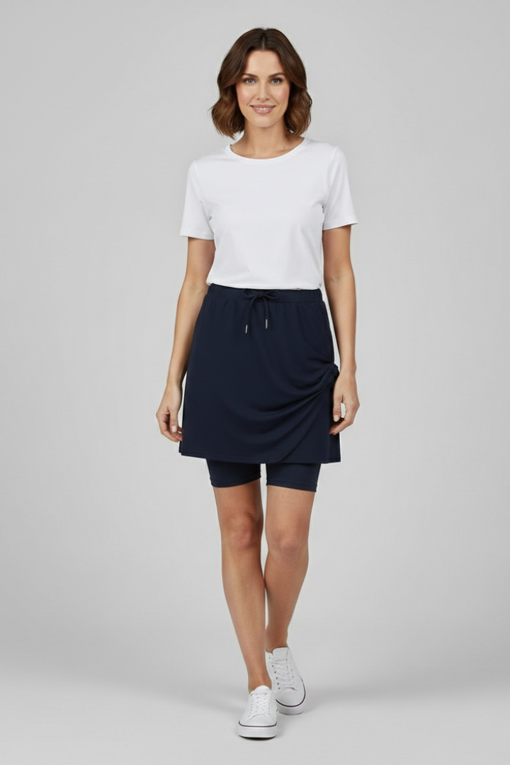 Female model front view skirt plain gray background