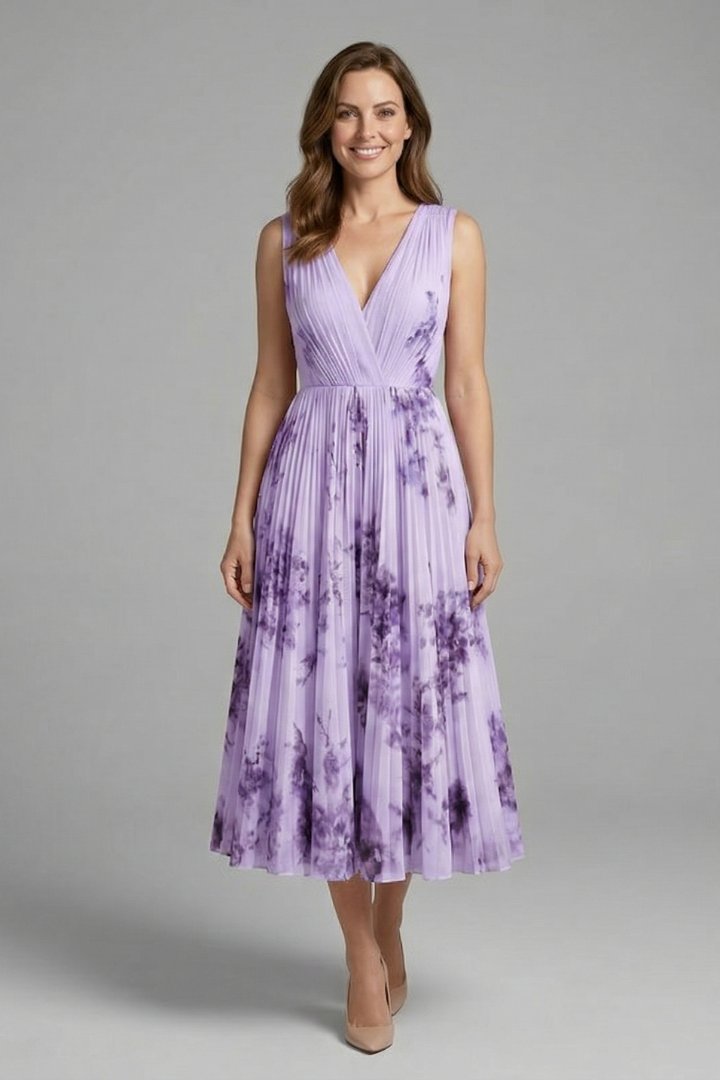Front pose of elegant pleated dress on model