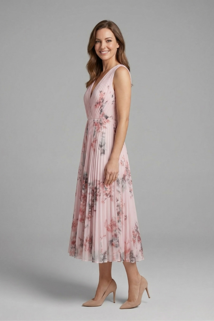 Front view model in sleeveless dress with heels