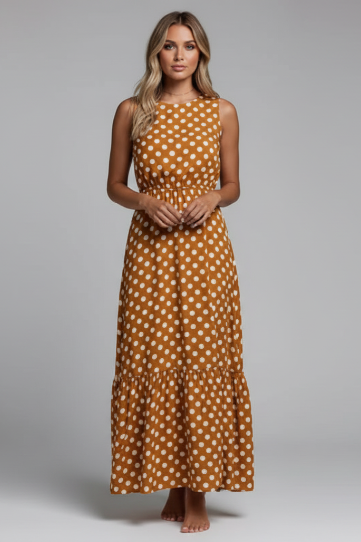 Woman wearing sleeveless wrap maxi dress front view gray background