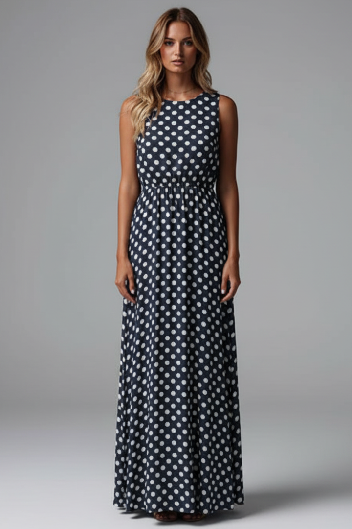 Female model slight turn showing front drape detail gray background