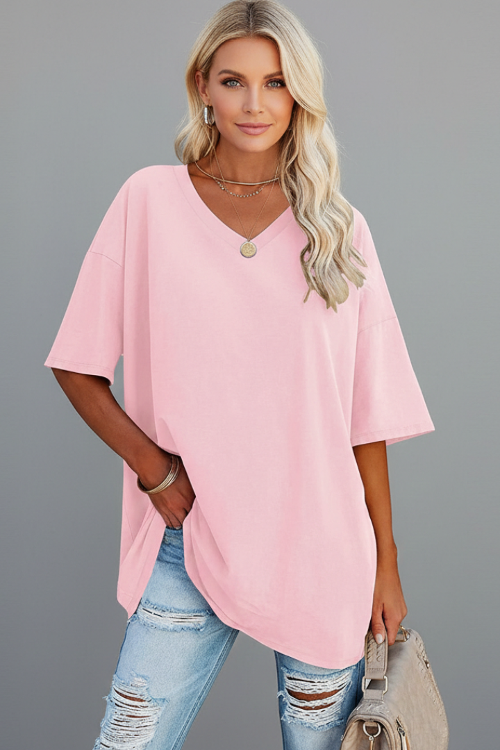 Casual v-neck fashion tee isolated clean pink background