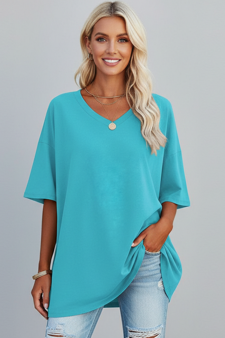 Model in blue top isolated product image grey background