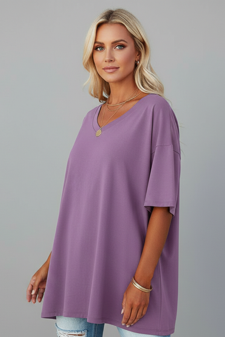 Women’s loose fit tee product shot gray background