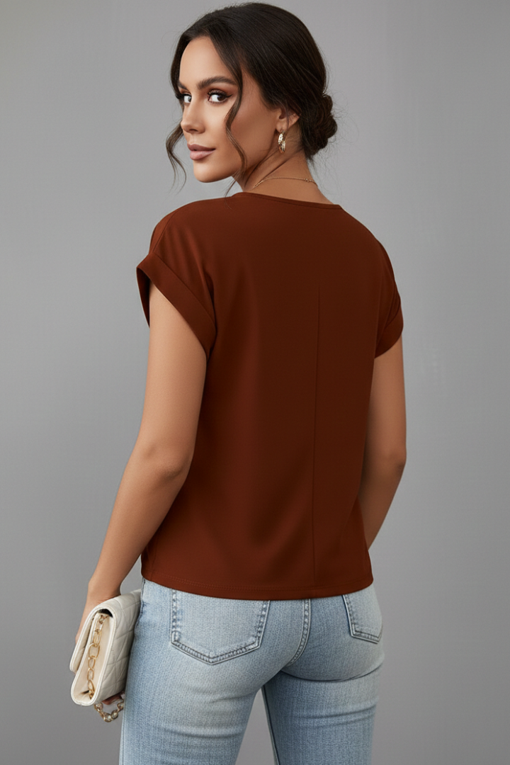 Minimal women’s fashion top back angle shot studio background