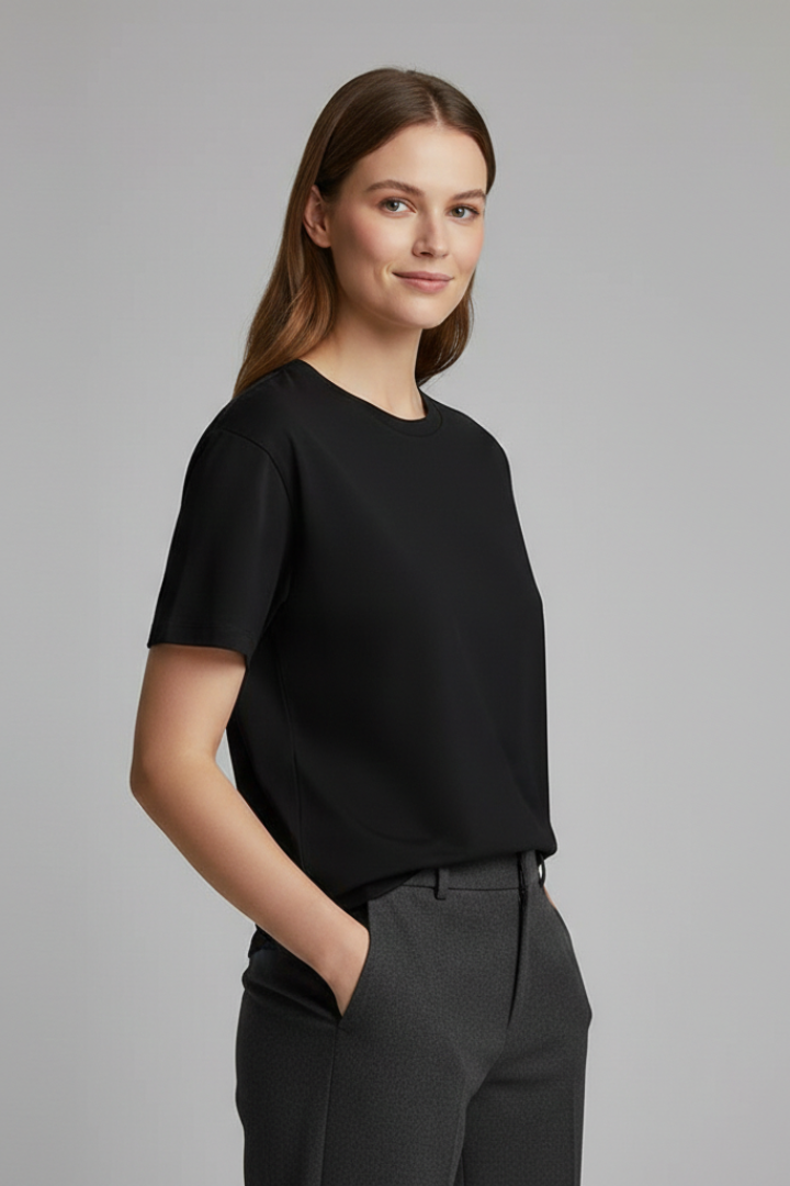 Woman wearing casual basic black top centered studio front photo