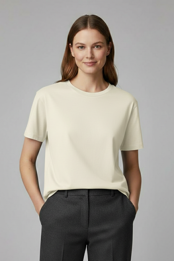 Model wearing basic white shirt product image with front perspective