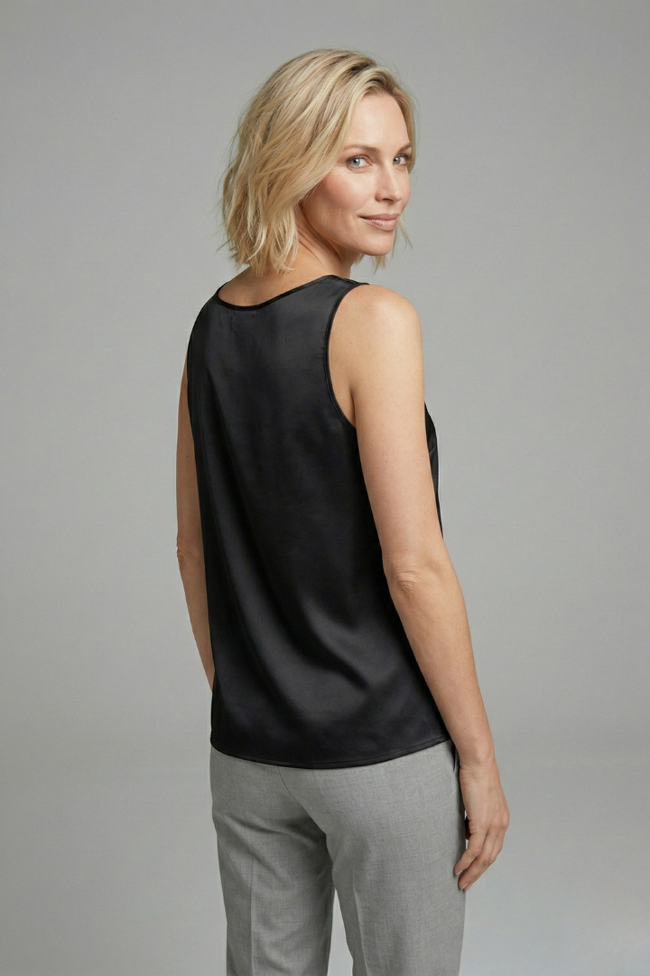 Woman sleeveless garment isolated on grey studio background
