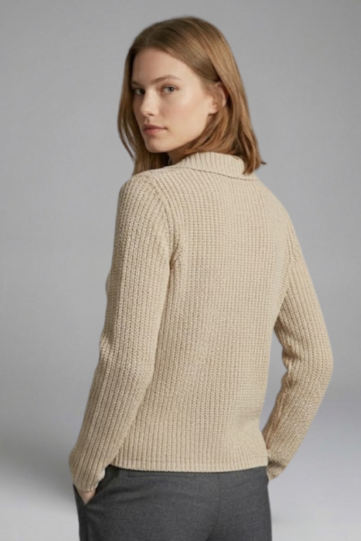 Back angle knitted blouse isolated on clean grey background