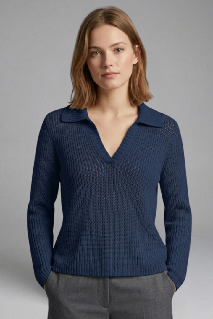 Simple women’s knit navy top isolated studio image