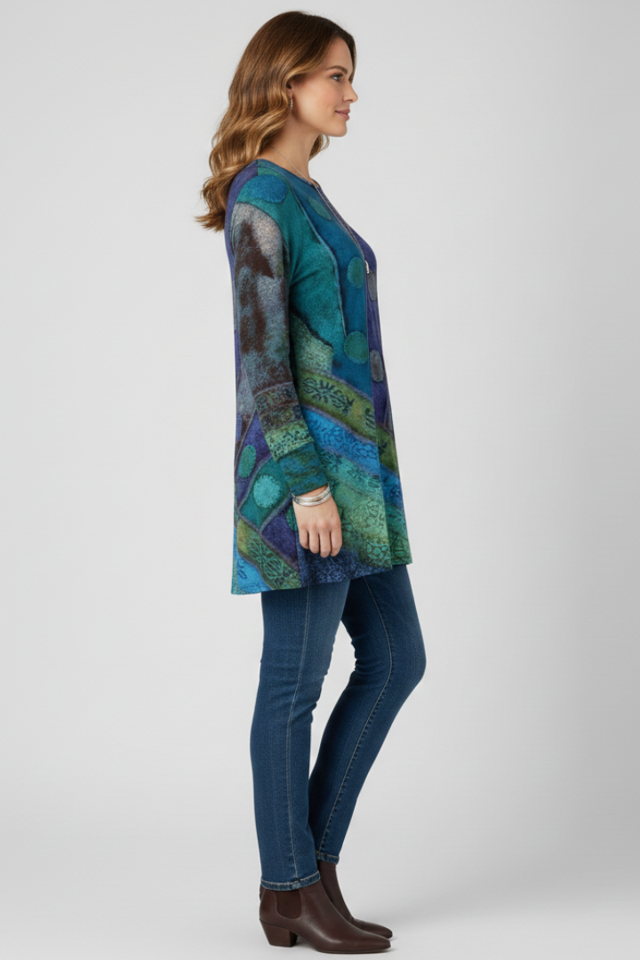 Model in side view relaxed fit tunic with ribbed cuffs