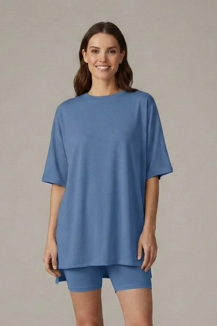 Female model front relaxed silhouette gray background